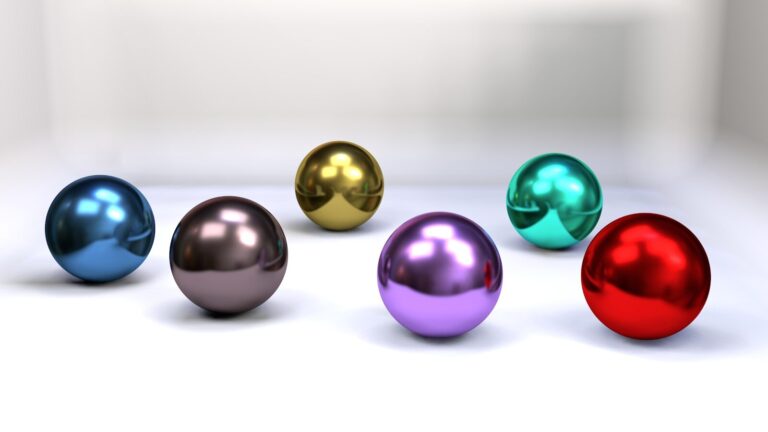Gold/ Edelmetalle Was sind Edelmetalle überhaupt? a group of shiny balls sitting on top of a white surface
